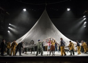 Robert Hayward as Captain Balstrode, Jennifer France as Niece 1, Aoife O’Sullivan as Niece 2, Mark le Brocq as Bob Boles (l-r) and the Chorus of Opera North. Photo credit: Bill Cooper