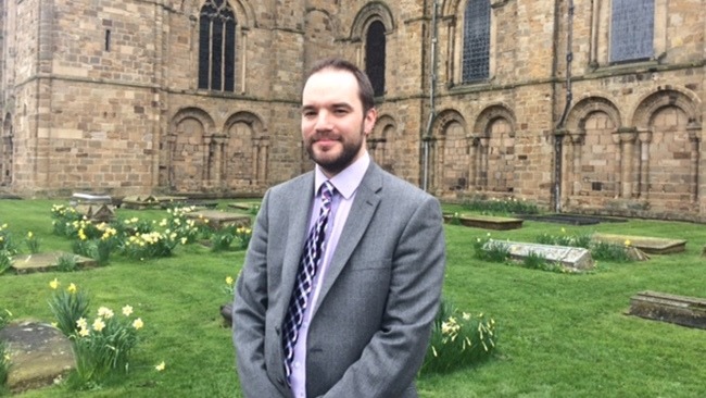 Daniel Cook outside Durham Cathedral